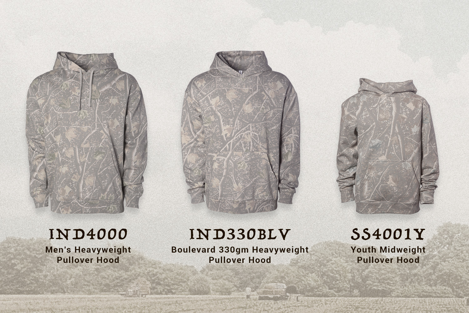 image of a field with 3 styles of hoodies with Deadwood Tree Camo pattern
